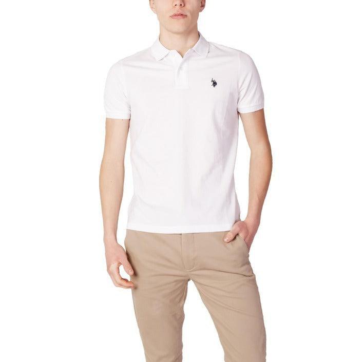 Man wearing white designer polo shirt and beige pants from GUOCALI Paris fashion collection