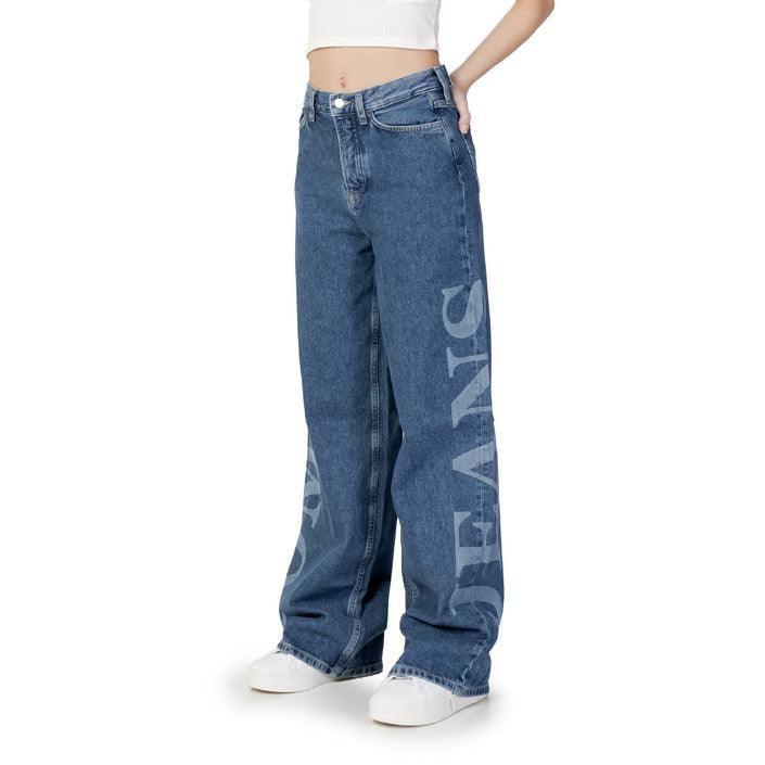 GUOCALI women's blue wide-leg jeans with large logo print, model in white crop top and sneakers
