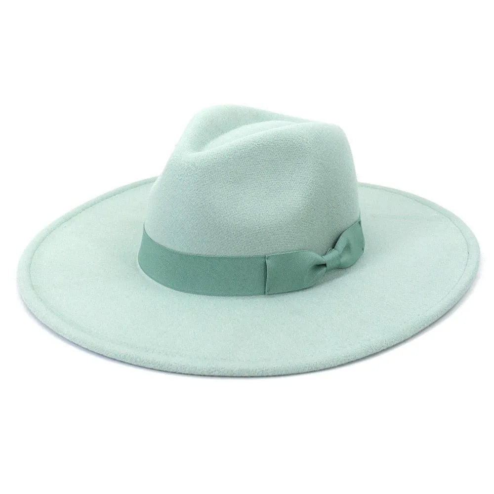 Light green wide-brim retro fedora hat with matching ribbon, contemporary luxury fashion