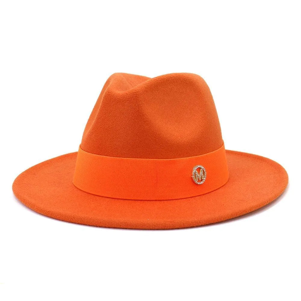 Elegant orange fedora hat for women with wide brim and decorative pin, by GUOCALI Paris