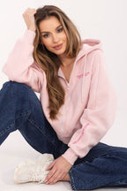 Women's hoodie pink chest lettering detail view