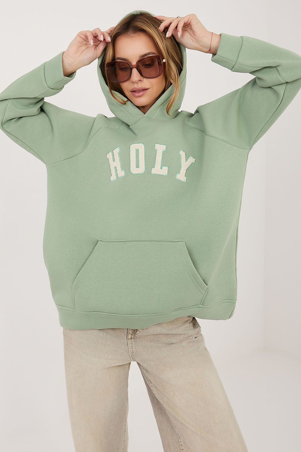 Women's hoodie green oversized embroidered logo front view