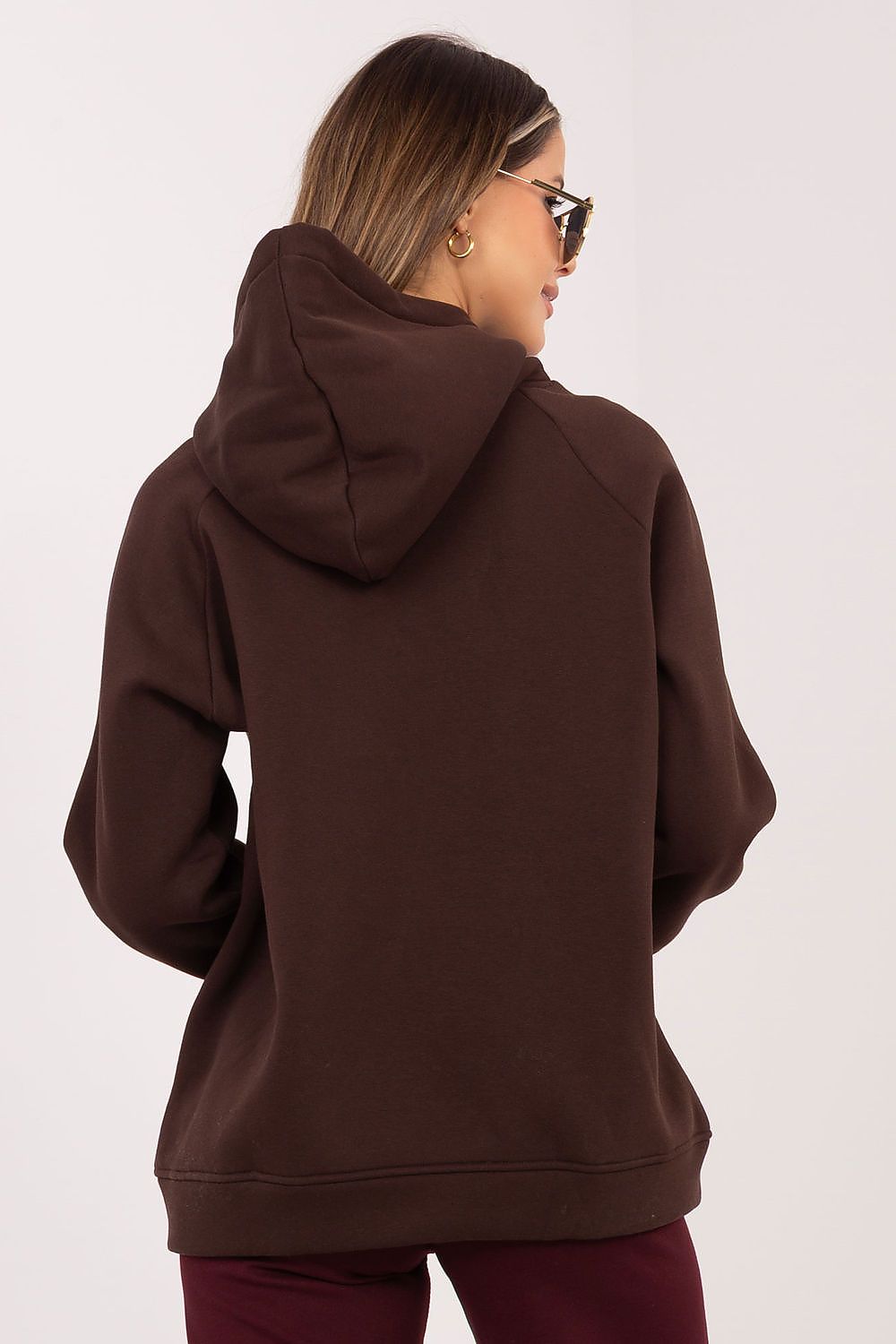 Women's hoodie brown logo detail view