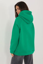 Women's hoodie green logo detail view