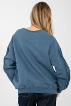 Women's sweatshirt blue chest embroidery detail view