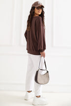 Women's sweatshirt brown puff sleeve side view