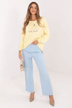 Women's sweatshirt yellow round neck side view