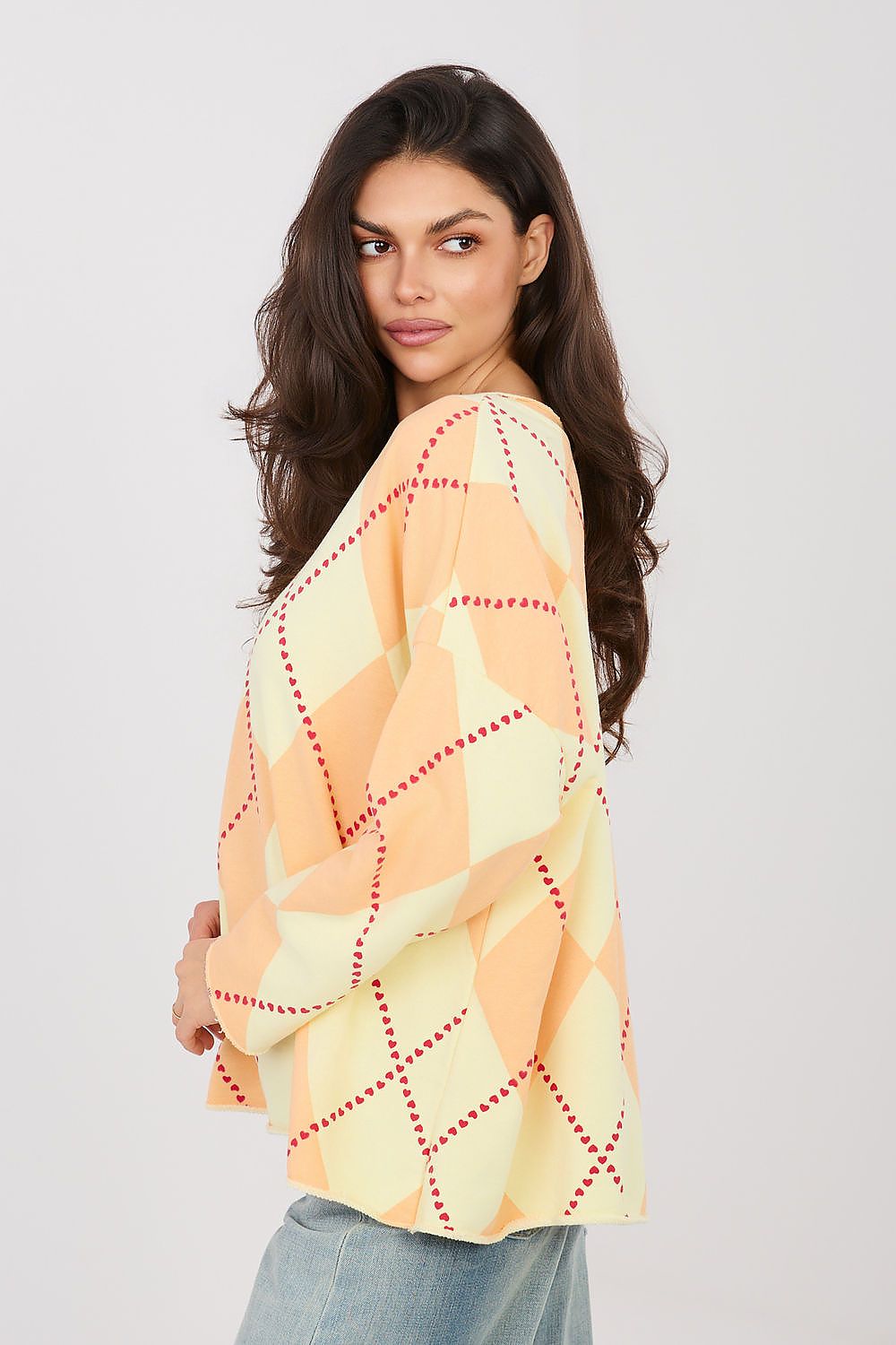 Women's sweatshirt orange argyle pattern detail view