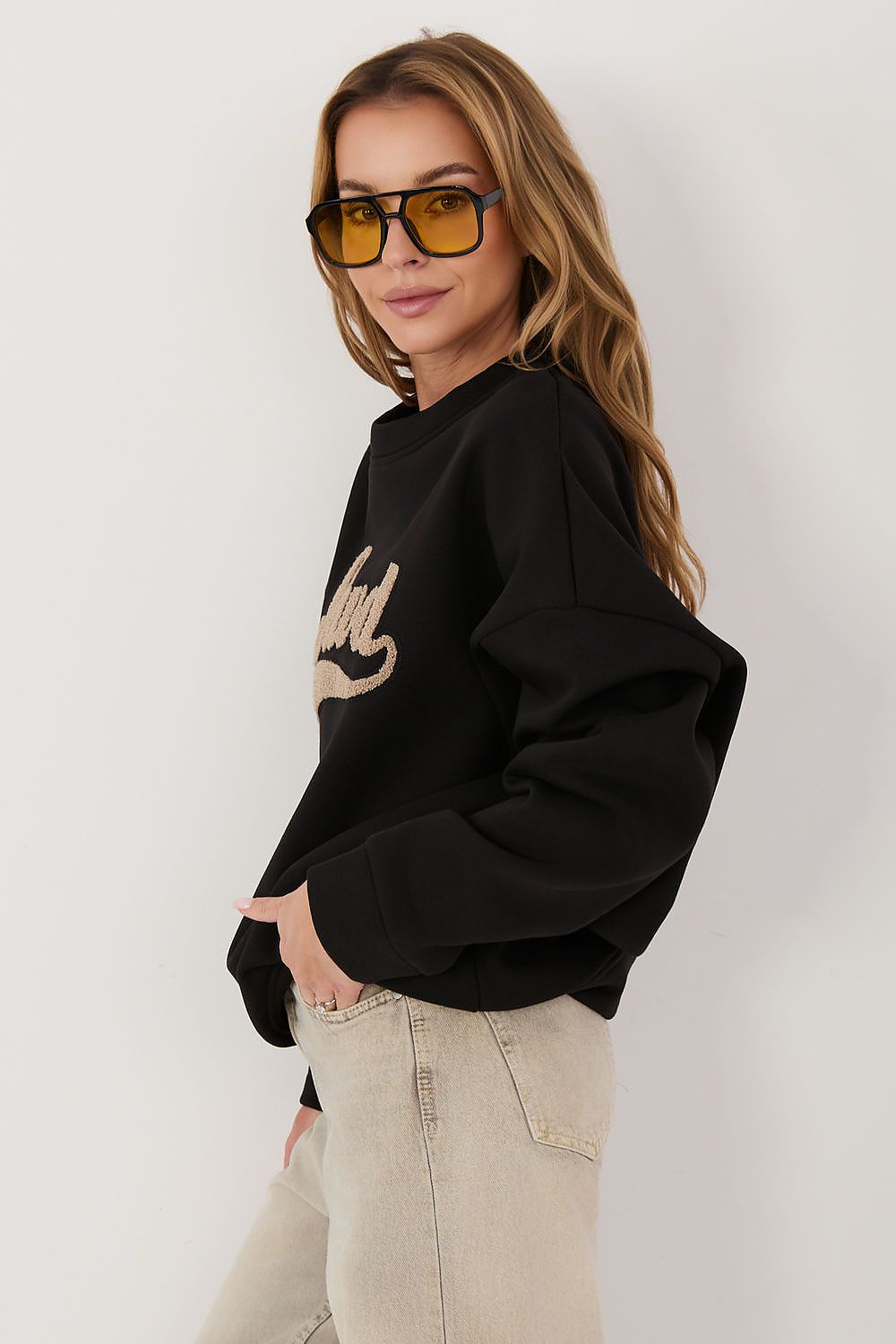 Women's sweatshirt black crew neck side view