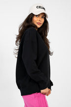 Women's sweatshirt black sleeve embroidery detail view