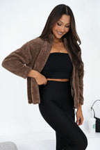 Women's sweatshirt beige soft teddy texture detail view