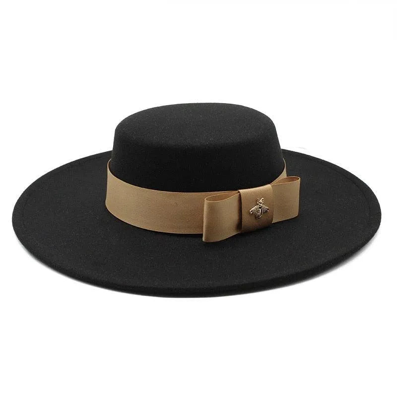 Black flat top fedora hat for women with tan bowknot and bee brooch, luxury fashion accessory